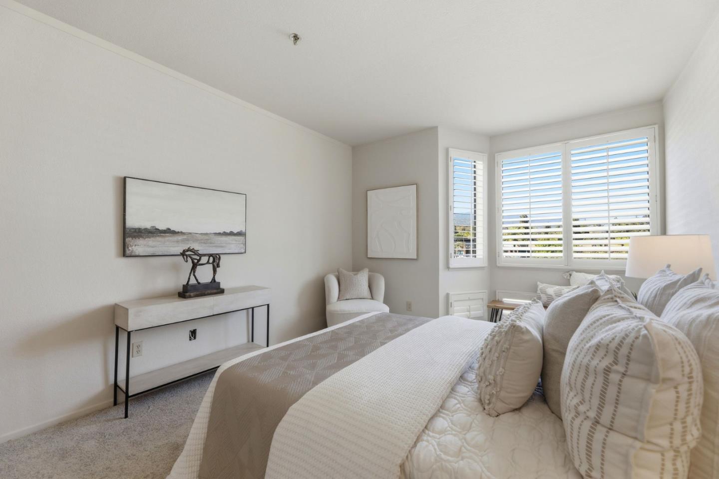 22330 Homestead Road, Unit 226 Cupertino, CA 95014 - Photo 22 of 38 a bedroom with a bed and a lamp
