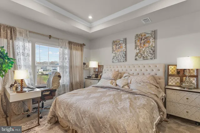 a bedroom with a bed and furniture