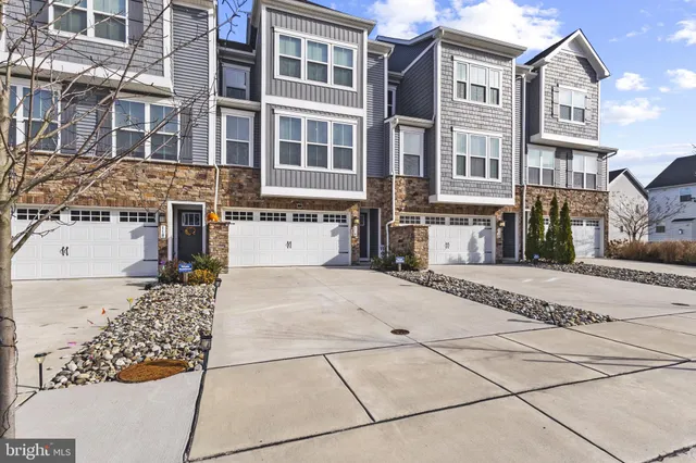 a very nice looking hallway with white walls
