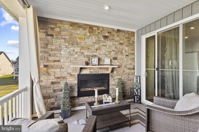 a front view of a residential apartment building with a yard