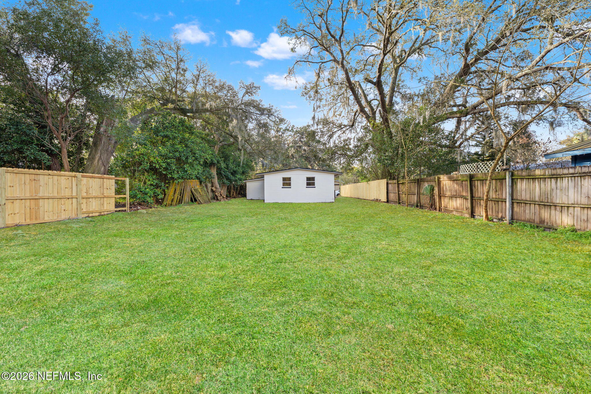 87 Josiah Street St. Augustine, FL 32084 - Photo 19 of 19 a view of a backyard with a garden