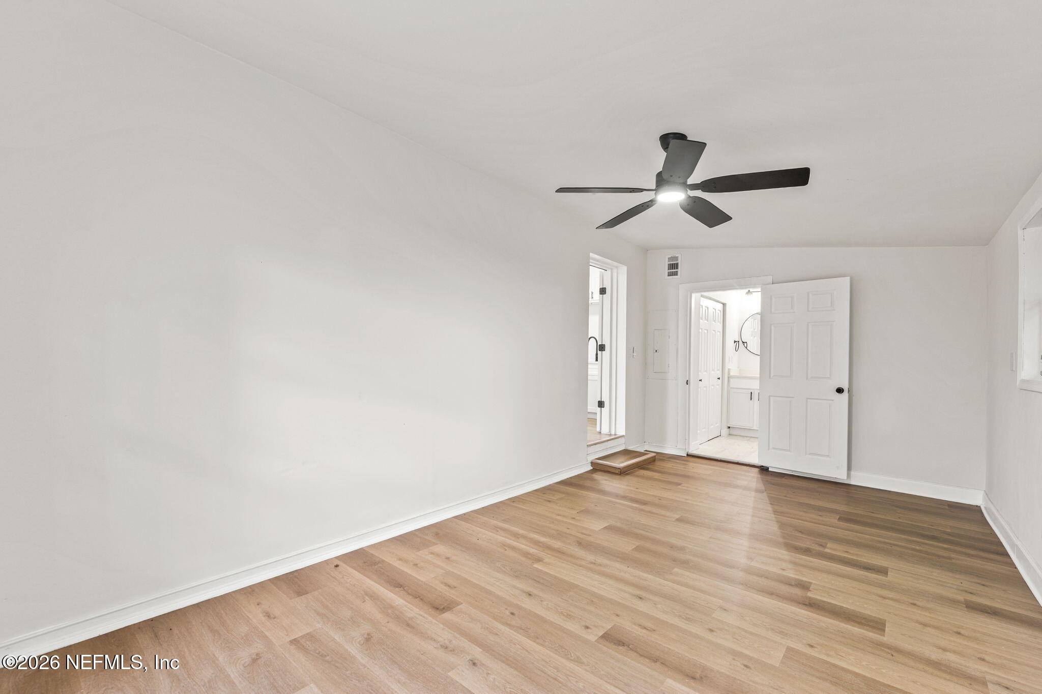 87 Josiah Street St. Augustine, FL 32084 - Photo 8 of 19 a view of an empty room with wooden floor