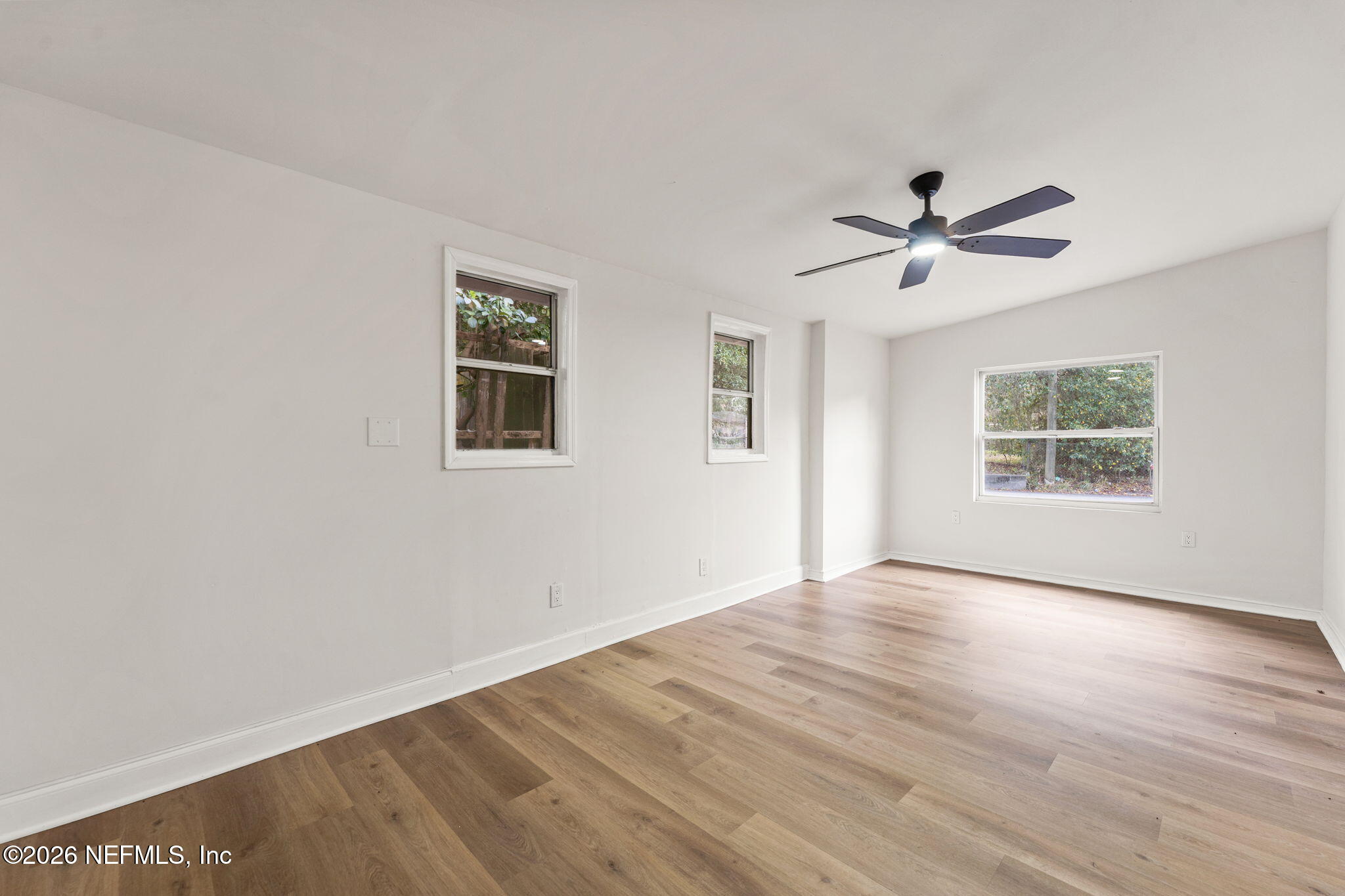 87 Josiah Street St. Augustine, FL 32084 - Photo 10 of 19 a view of empty room with wooden floor and fan