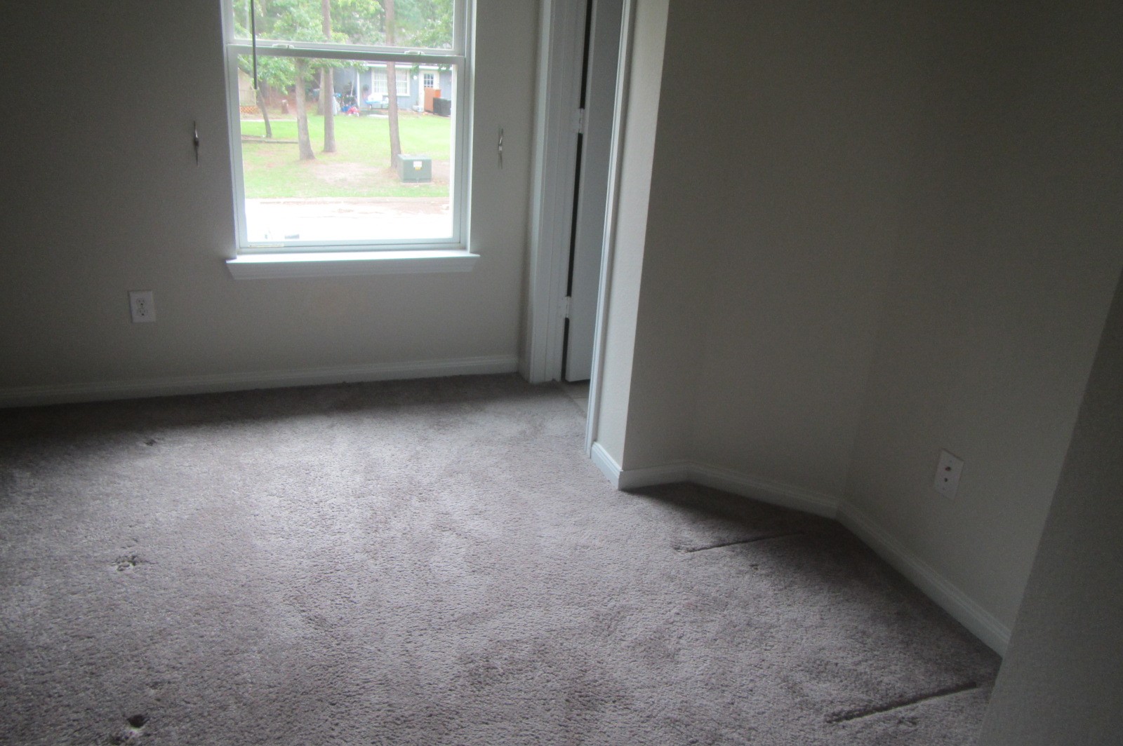 28612 Netawake Court Point Blank, TX 77364 - Photo 10 of 14 an empty room with a window