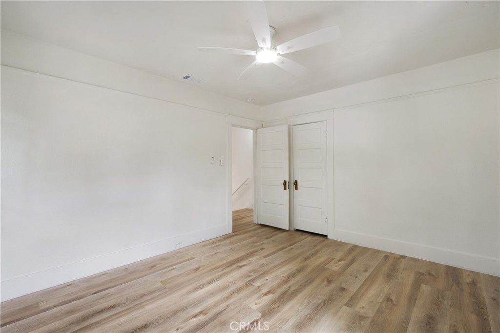 4415 12th Street Riverside, CA 92501 - Photo 20 of 33 wooden floor in a empty room