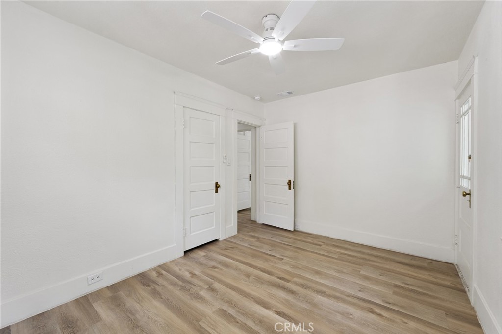 4415 12th Street Riverside, CA 92501 - Photo 24 of 33 wooden floor in an empty room