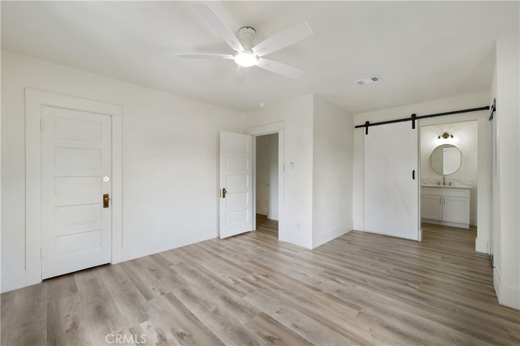 4415 12th Street Riverside, CA 92501 - Photo 27 of 33 a view of empty room with wooden floor