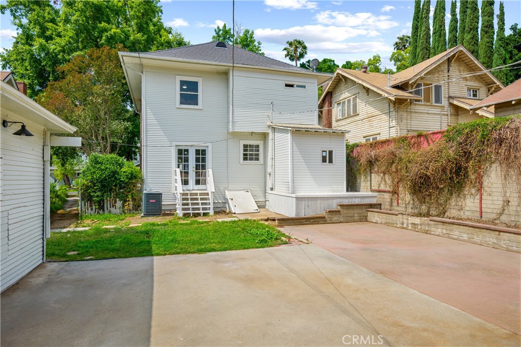4415 12th Street Riverside, CA 92501 - Photo 32 of 33 front view of a house with a yard