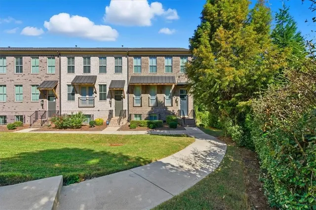 front view of a house with a yard