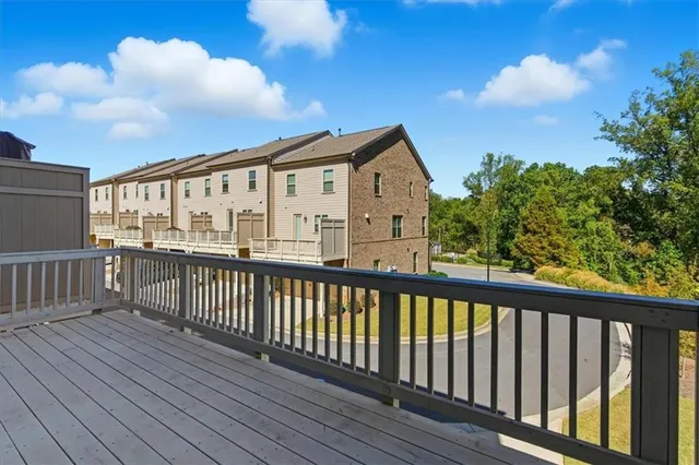 a view of a houses with a balcony