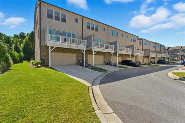 a front view of building with yard