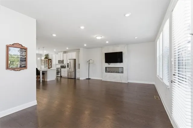 a view of a kitchen with a sink and a microwave