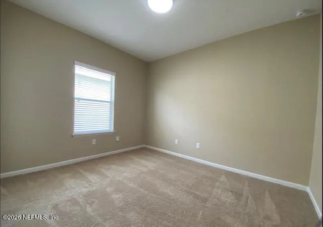 an empty room with a window