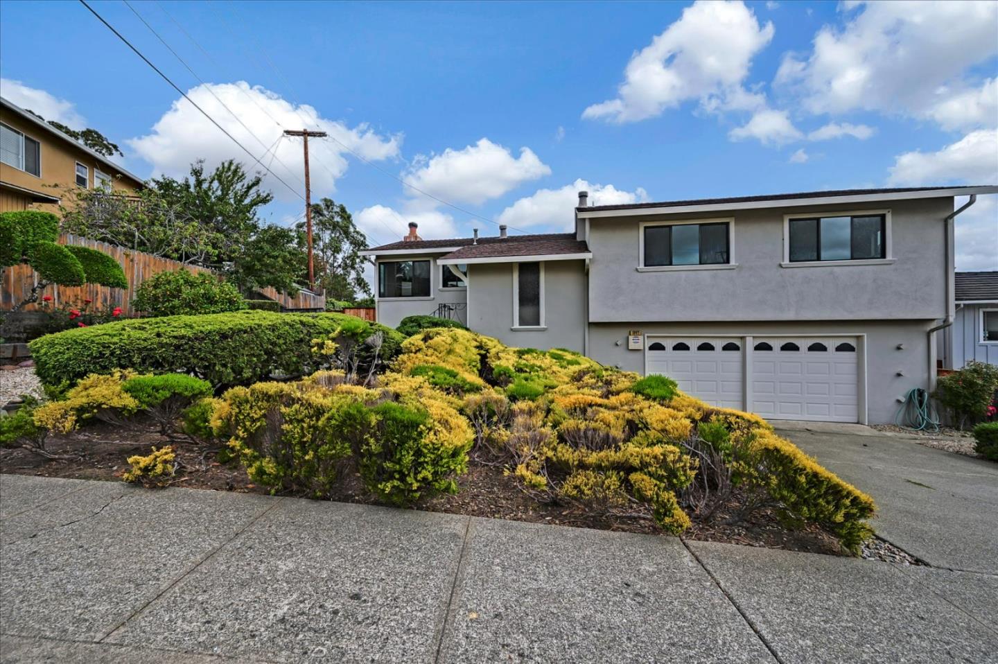 1092 Crestview Drive Millbrae, CA 94030 - Photo 1 of 34 a front view of house with a garden