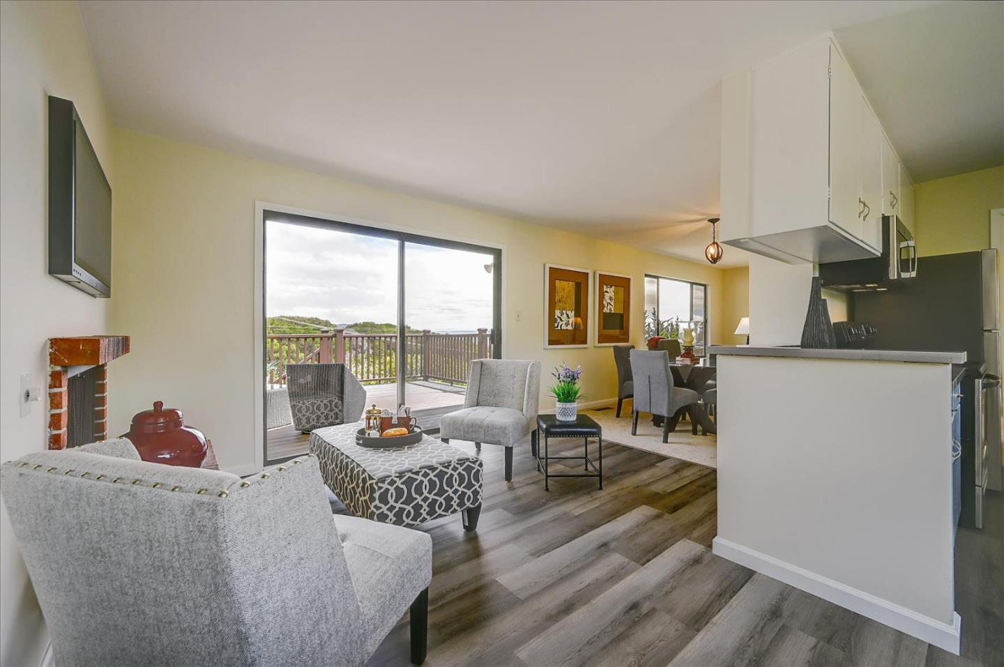 1092 Crestview Drive Millbrae, CA 94030 - Photo 14 of 34 a living room with fireplace furniture and a large window