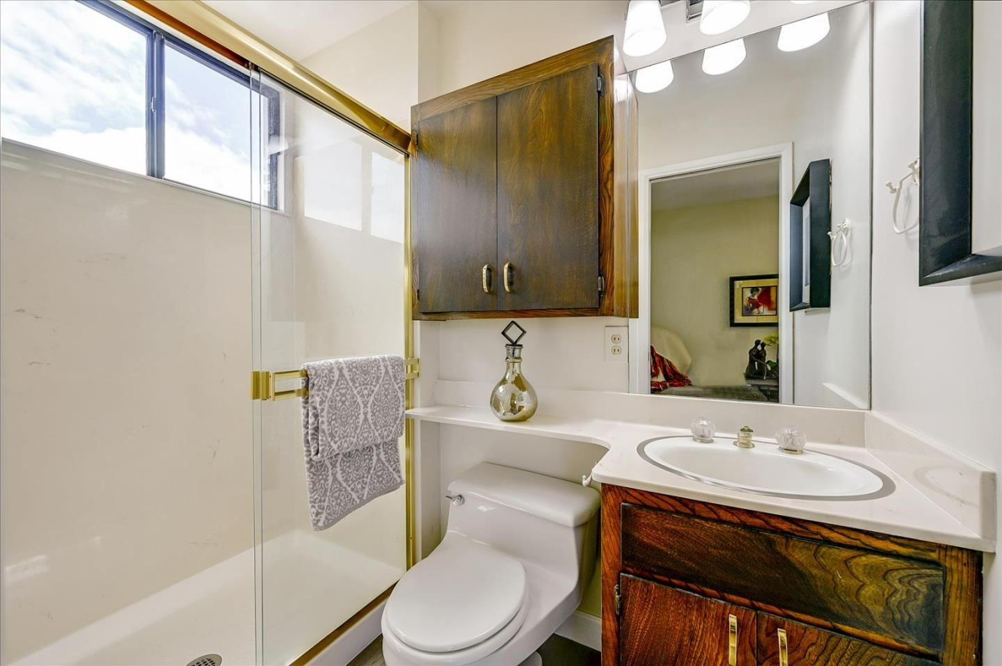 1092 Crestview Drive Millbrae, CA 94030 - Photo 19 of 34 a bathroom with a sink toilet and shower