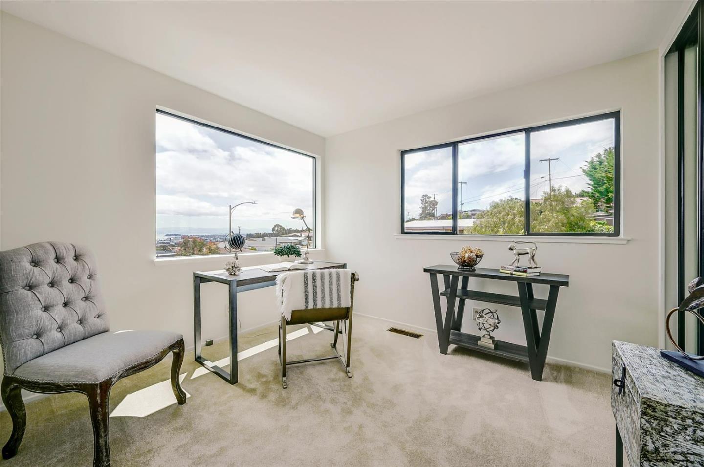 1092 Crestview Drive Millbrae, CA 94030 - Photo 20 of 34 a view of a workspace with furniture and a window