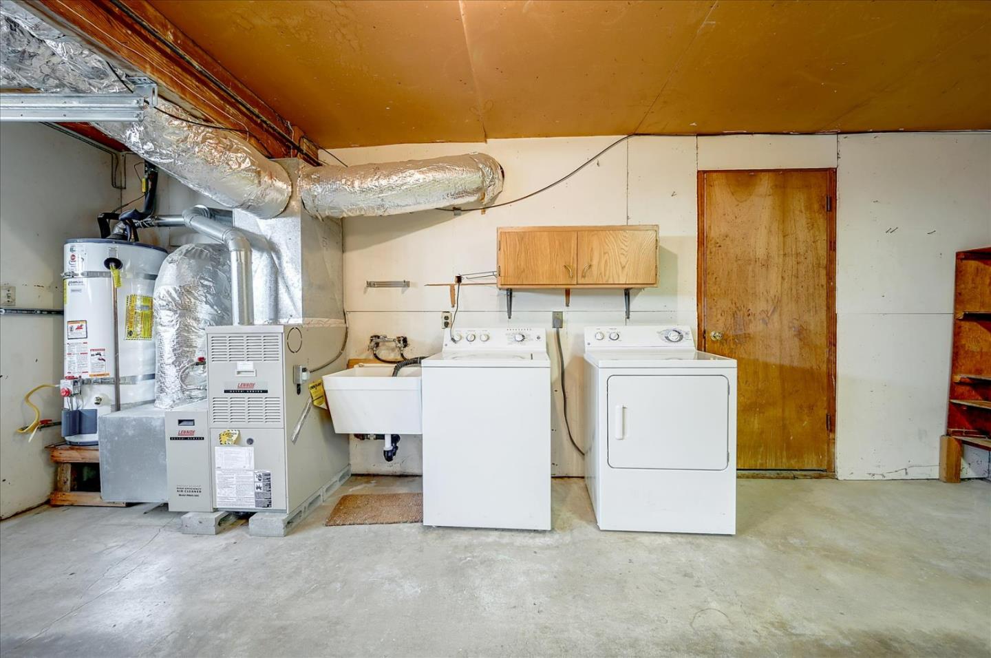 1092 Crestview Drive Millbrae, CA 94030 - Photo 27 of 34 a utility room with dryer and washer