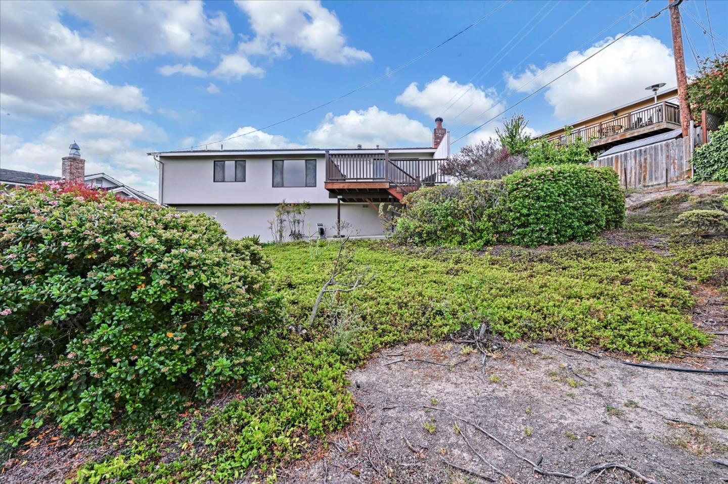1092 Crestview Drive Millbrae, CA 94030 - Photo 30 of 34 a view of a house with a yard and garden