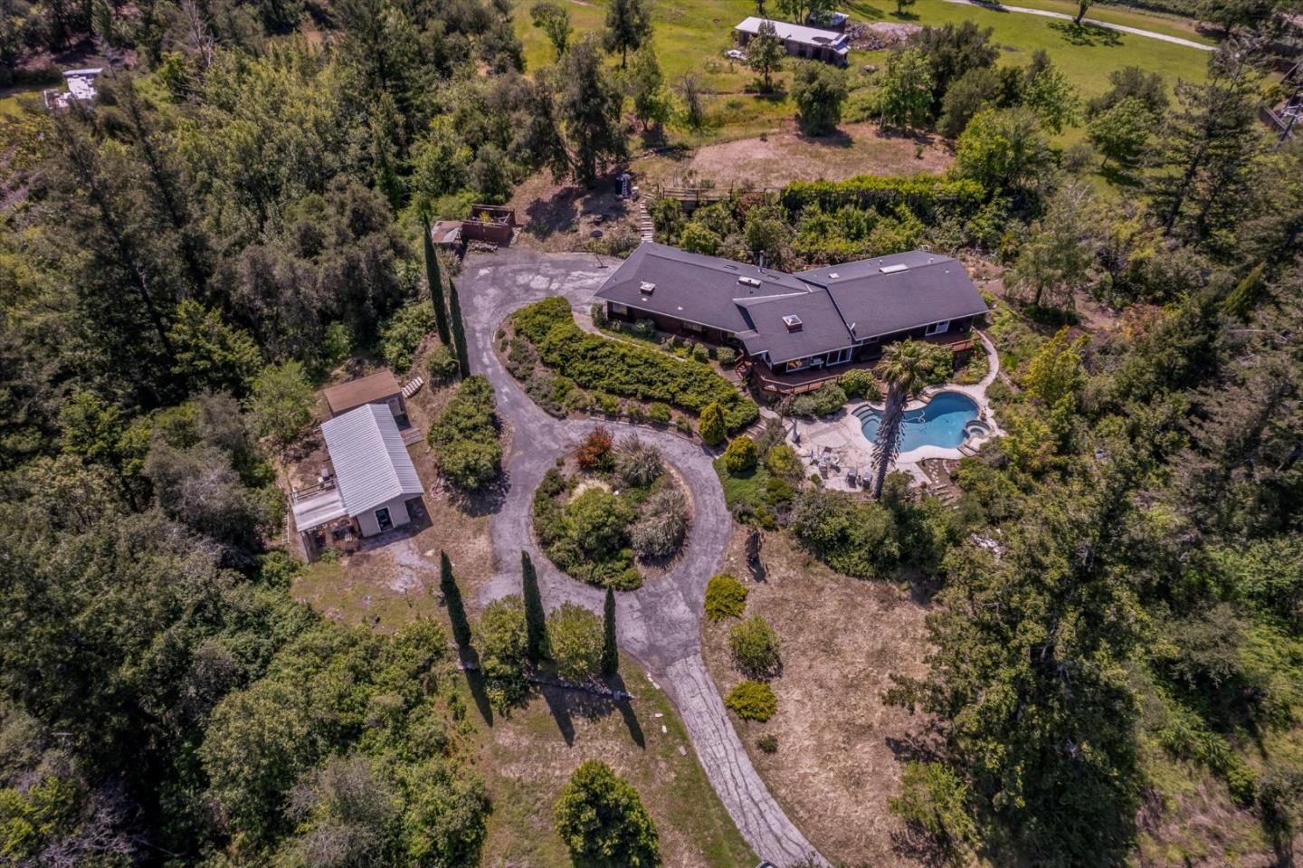 25149 Radonich Road Los Gatos, CA 95033 - Photo 2 of 47 an aerial view of a house with a yard