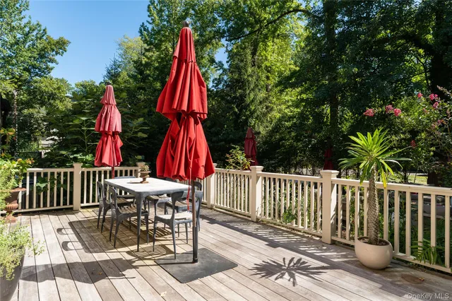 a view of a chair and tables in the garden