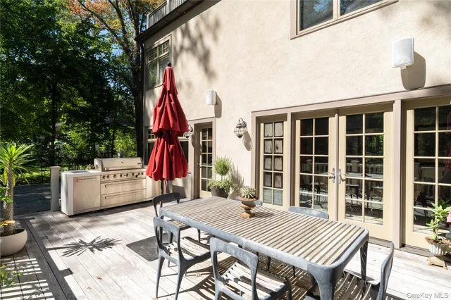 an outdoor space with furniture and garden view