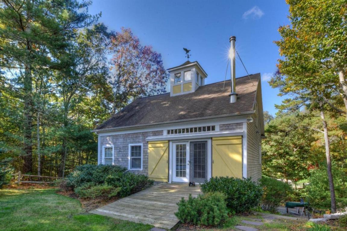 26 Cove Road Forestdale, MA 02644 - Photo 21 of 35 a front view of a house with garden