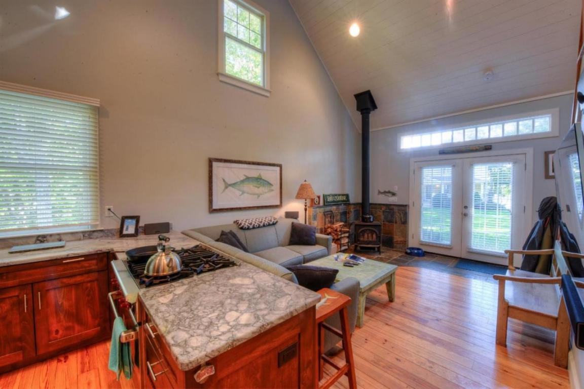 26 Cove Road Forestdale, MA 02644 - Photo 22 of 35 a living room with furniture and a wooden floor