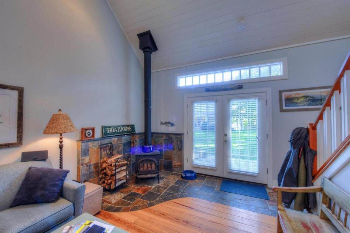 26 Cove Road Forestdale, MA 02644 - Photo 24 of 35 a living room with furniture a window and a flat screen tv