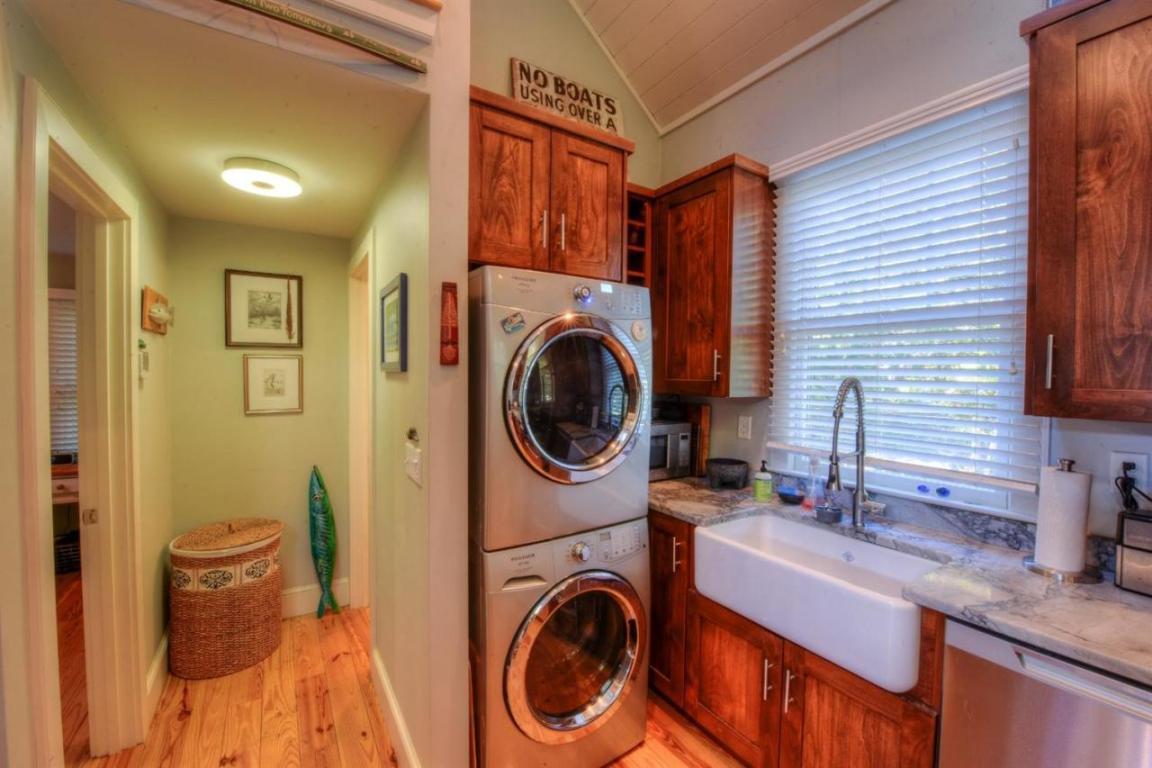26 Cove Road Forestdale, MA 02644 - Photo 26 of 35 a utility room with sink dryer and washer