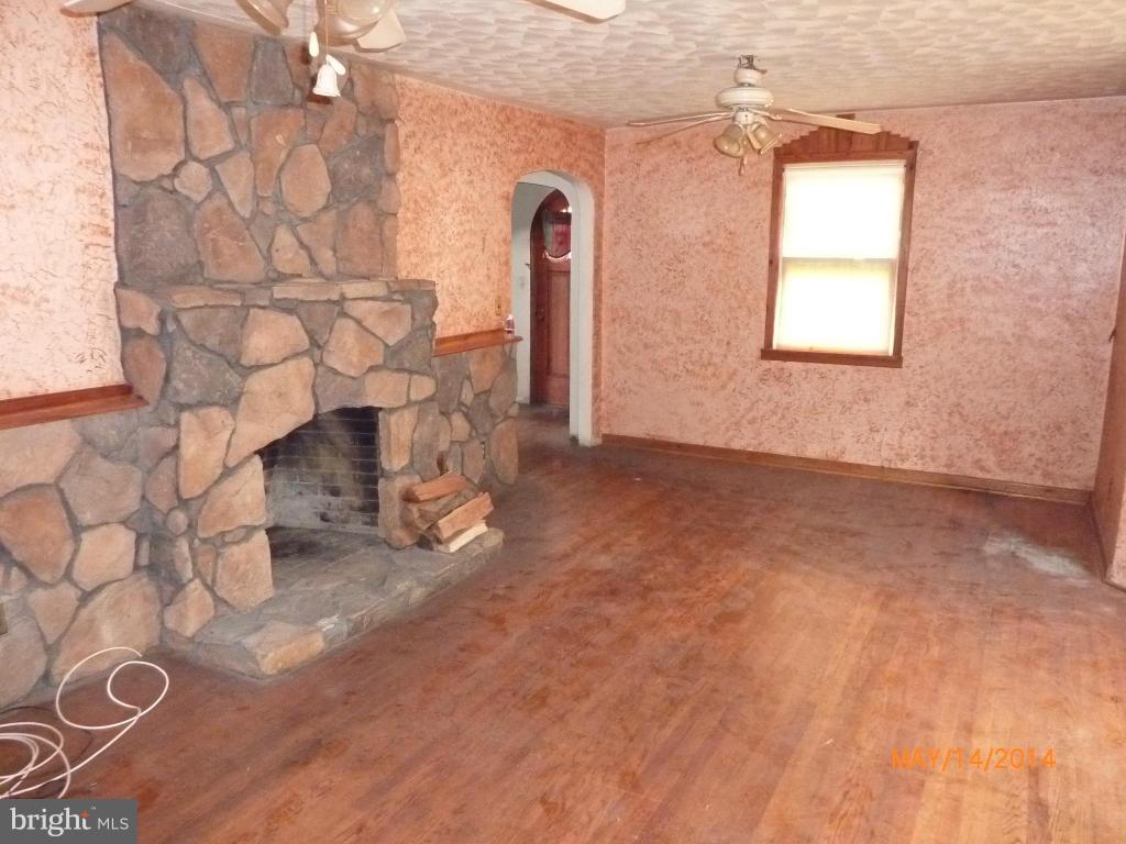 8321 Philadelphia Road Baltimore, MD 21237 - Photo 3 of 15 a view of an empty room with a window