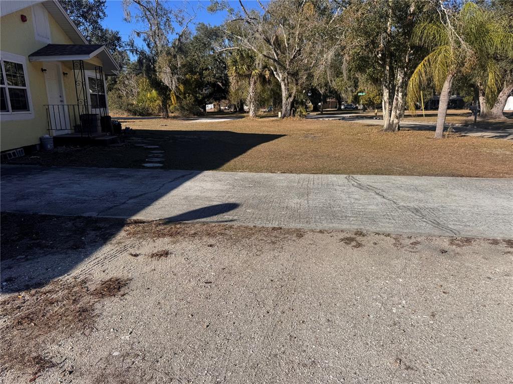 227 North Smith Avenue Arcadia, FL 34266 - Photo 9 of 10 a view of road with yard