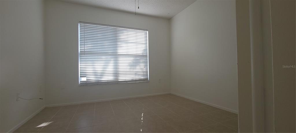 2913 Forrestal Court New Port Richey, FL 34655 - Photo 12 of 16 a room that has a window in it