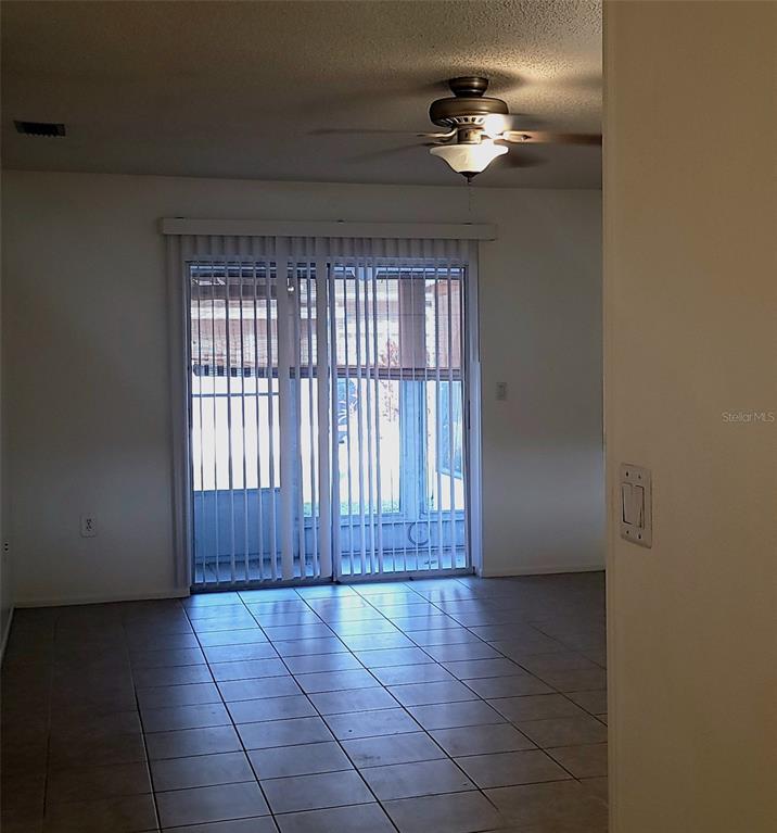 2913 Forrestal Court New Port Richey, FL 34655 - Photo 2 of 16 a view of an empty room with a window