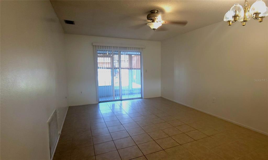 2913 Forrestal Court New Port Richey, FL 34655 - Photo 5 of 16 a view of an empty room with a window
