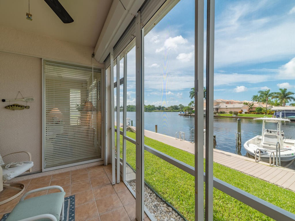237 Sunrise Cay, Unit 101 Naples, FL 34114 - Photo 12 of 18 a view of a balcony with lake view