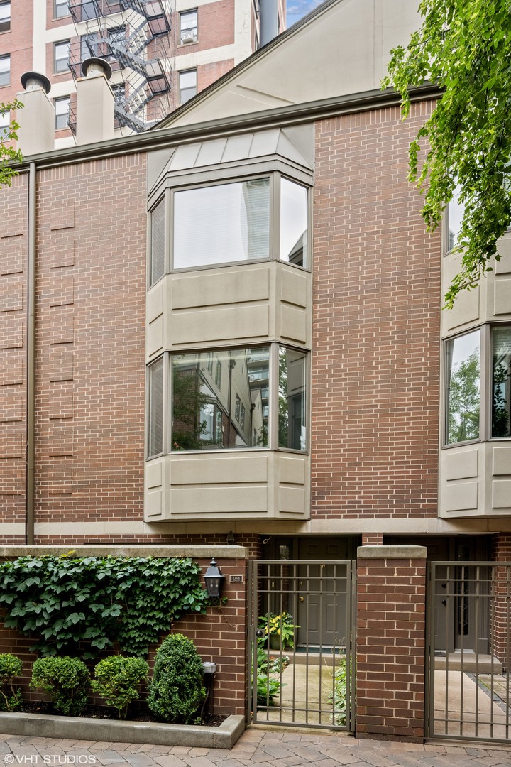 55 West Goethe Street, Unit 1251 Chicago, IL 60610 - Photo 1 of 28 a view of a house with a window