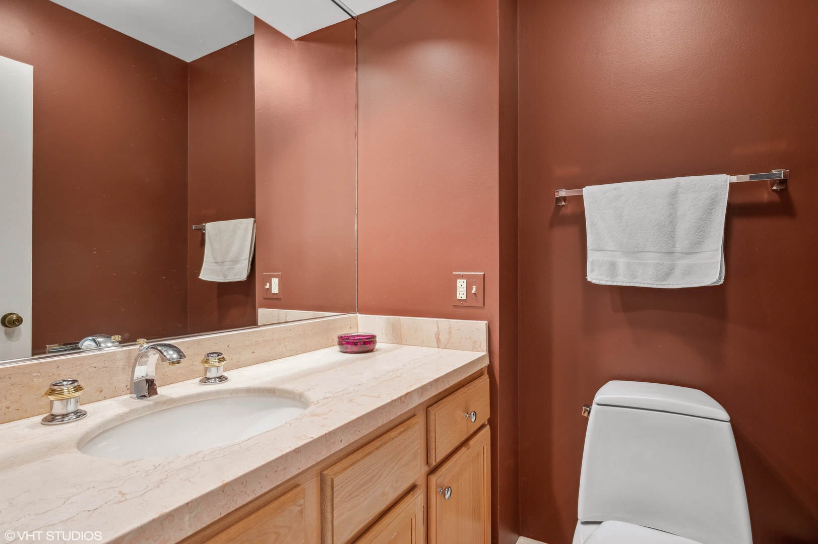 55 West Goethe Street, Unit 1251 Chicago, IL 60610 - Photo 16 of 28 a bathroom with a sink and a mirror