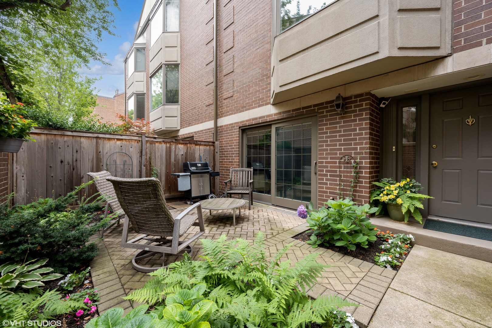 55 West Goethe Street, Unit 1251 Chicago, IL 60610 - Photo 3 of 28 a view of a chair and tables in the patio