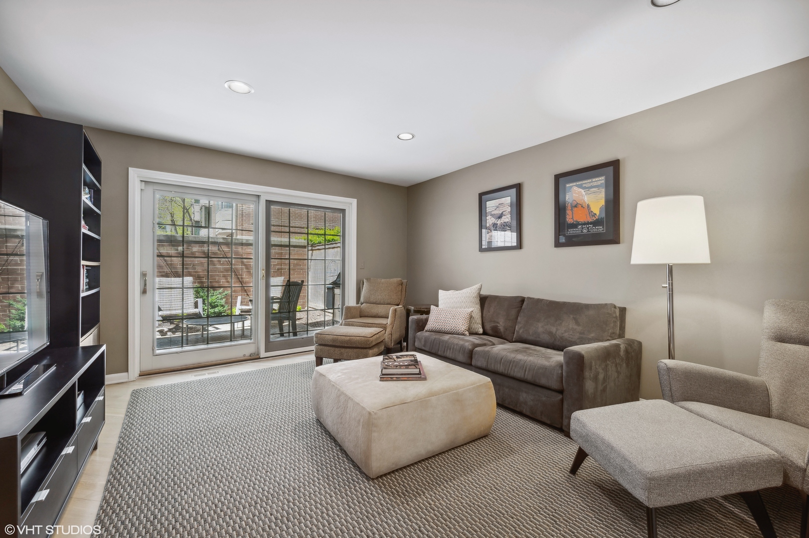 55 West Goethe Street, Unit 1251 Chicago, IL 60610 - Photo 6 of 28 a living room with furniture large window and flat screen tv