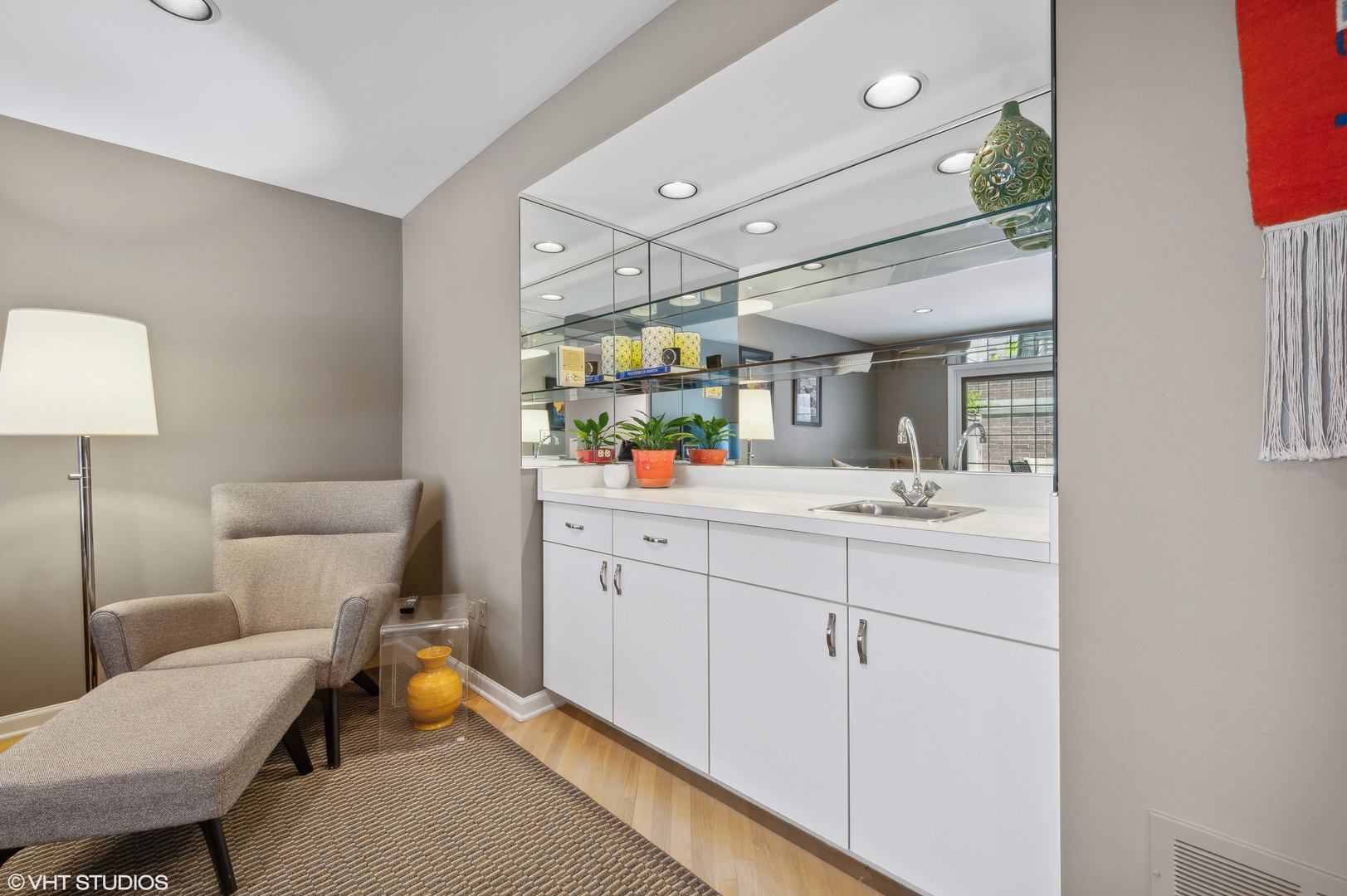 55 West Goethe Street, Unit 1251 Chicago, IL 60610 - Photo 7 of 28 a spacious bathroom with a sink a mirror and a lamp