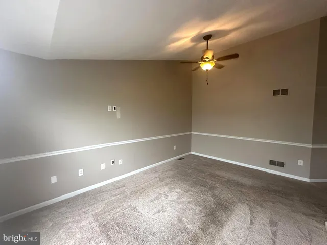 a view of a chandelier fan