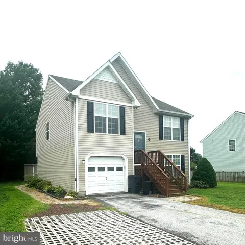 a view of a house with a patio