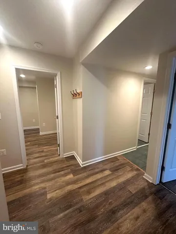 a view of kitchen and wooden floor