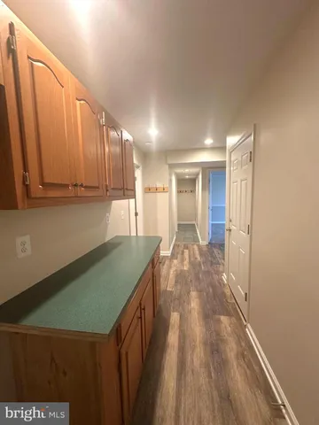 a view of empty room with windows