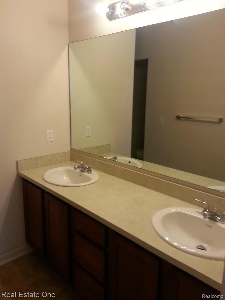 440 Hilton Road Ferndale, MI 48220 - Photo 16 of 18 MASTER BATH WITH DUAL SINKS