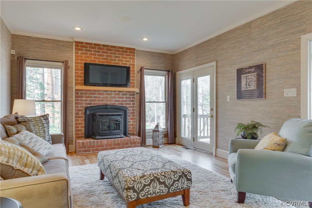 13806 Beechwood Point Road Midlothian, VA 23112 - Photo 13 of 48 a living room with furniture and a fireplace