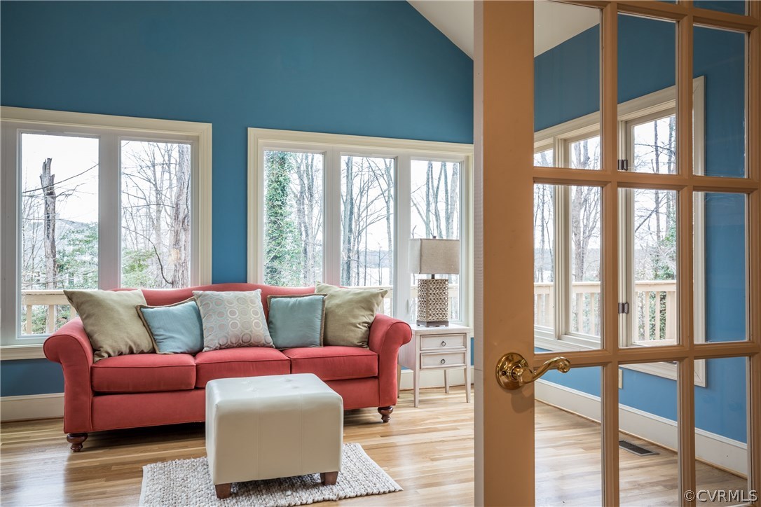 13806 Beechwood Point Road Midlothian, VA 23112 - Photo 15 of 48 a living room with furniture and a large window