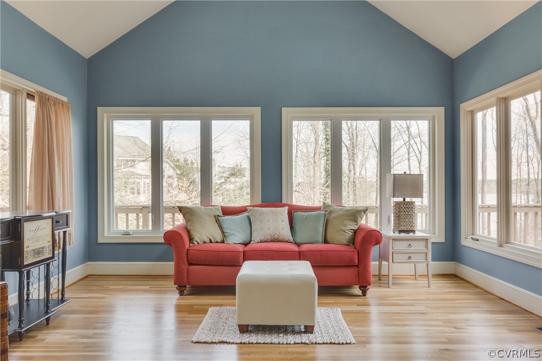 13806 Beechwood Point Road Midlothian, VA 23112 - Photo 16 of 48 a living room with furniture and a large window
