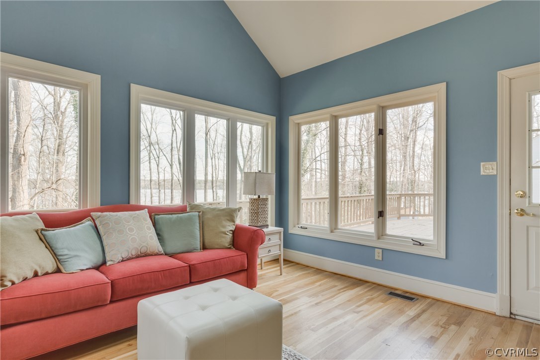 13806 Beechwood Point Road Midlothian, VA 23112 - Photo 17 of 48 a living room with furniture and a large window
